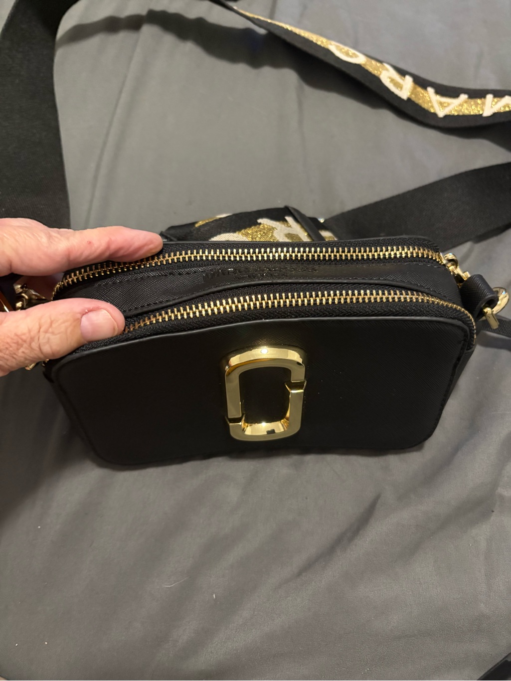 Marc Jacobs Black Crossbody With Gold Hardware And Logo Strap
